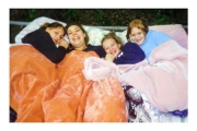 Karly, Jenna, Jess and Kelly sleeping on Tramp in back yard