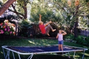 Krista and Jess on backyard trampoline (2001)